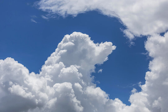 white clouds on colorful clear blue sky in tropical climate