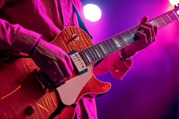 Naklejka premium A vibrant musician strumming an electric guitar under colorful stage lights. The rich tones of the guitar create a lively atmosphere. Music brings joy. Generative AI