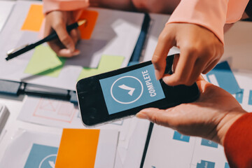 Young Asian business creative team work together, mobile application software design project. Brainstorm meeting, internet technology, smartphone web app designer, office coworker teamwork concept