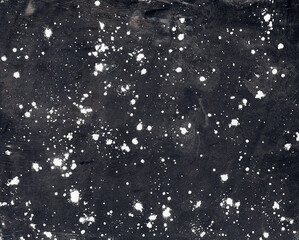 weiß gesprenkelte Tupfer auf schwarzem Hintergrund