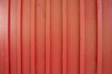 Red wooden board fence background with fence wood planks