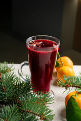 mulled wine with oranges and fir branches