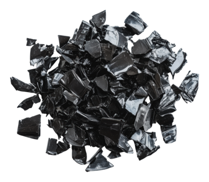 Black glass fragments scattered on a white surface, cut out - stock png.