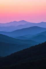 Serene mountain landscape at dusk with layered hills and soft colors.