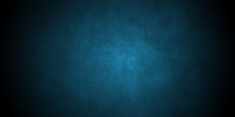 Grunge dark blue rock studio stucco antique grunge spot light backdrop background. concrete distressed gradient limestone sketch wall rough blank aged texture background.