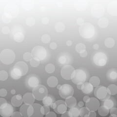 Silver bokeh poster with gradient mesh. abstract background with white bokeh effect. abstract bokeh lights with soft gray light background. magic light