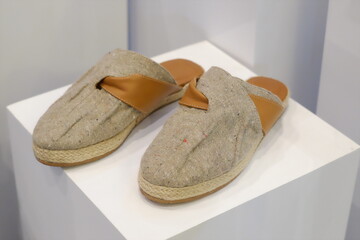 A variety of unique and stylish shoes are displayed together, showcasing craftsmanship and design diversity.
