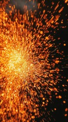 Dynamic and vibrant close-up image of fire sparks particles flying in all directions, glowing, flames