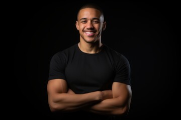 Fototapeta premium A man with a black shirt and a smile on his face