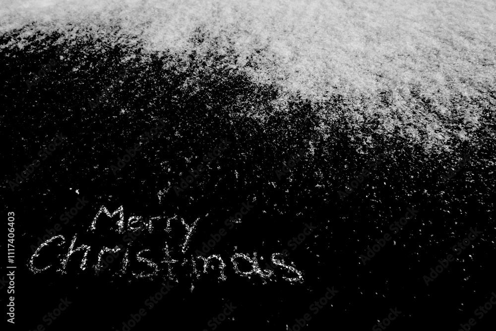 Poster Natural white snow with Christmas inscription on the black background