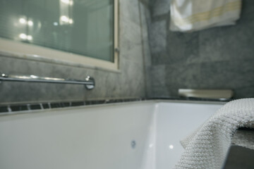 Super deluxe black and white marble bathroom of suite stateroom cabin onboard luxury ocean liner...