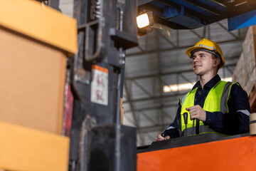 Man worker driver forklift warehouse in factory. Male worker industrial operate. control loading...