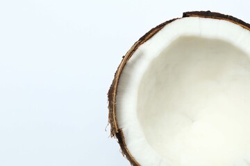 Coconut on white background, top view
