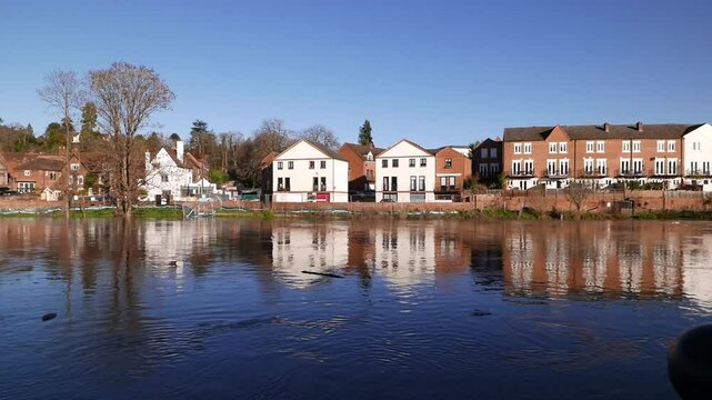 The River Severn flooding its banks at Bewdley after Storm Bert. Worcestershire. UK. 2024