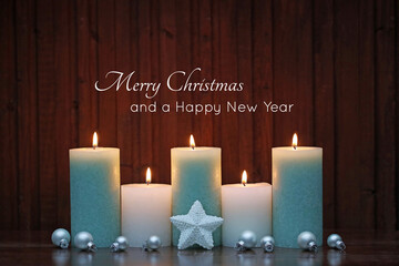 Merry Christmas and a Happy New Year. Christmas and New Year greetings with candles and Christmas...
