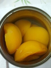 Preserved peaches in a can