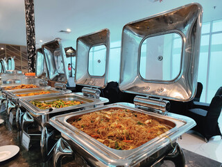Asian Buffet Breakfast with Fried Rice, Noodles, and Traditional Dishes
