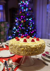 A delicious and tempting cake decorated with almonds and raspberries