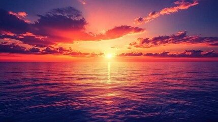 A vibrant sunset over a calm ocean, showcasing nature's beauty.