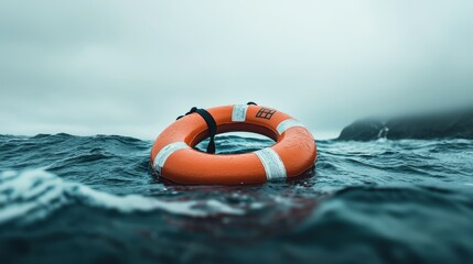 Naklejka premium Lifebuoy floating in a calm ocean environment