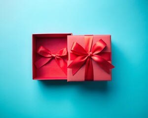 Two beautifully wrapped red gift boxes sit open against a vibrant blue backdrop, inviting joy and excitement as they promise delightful surprises within