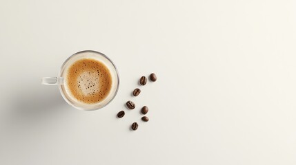 A cup of coffee with coffee beans on a minimalist surface.