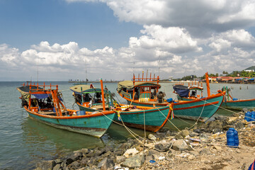 Crab fishing boat resting on the shore in Ket, Cambodia