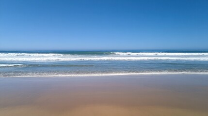 Serene Beachscape Underneath a Clear Blue Sky
