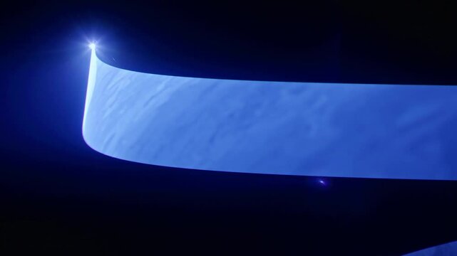Temporal aliasing blue laser changing effects in smoke creates a high-tech science fiction minimal abstract futuristic techno rave feeling for scifi motion graphic asset. Black background, wide beam.