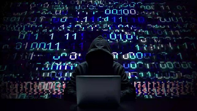 Hacker working on laptop on abstract digital background