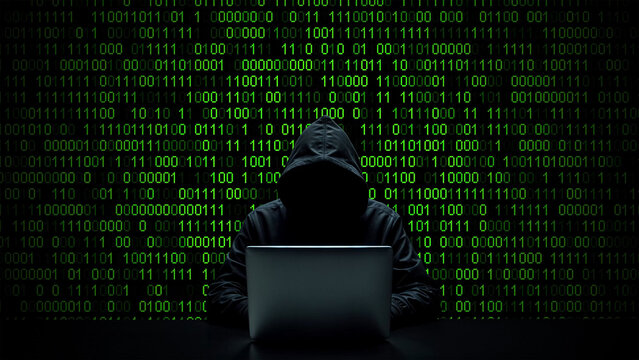 Hacker working on laptop on abstract digital background