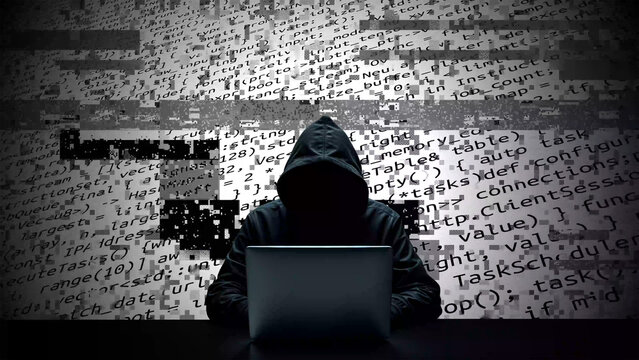 Hacker working on laptop on abstract digital background