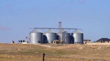 Obraz premium tanks industry on the field