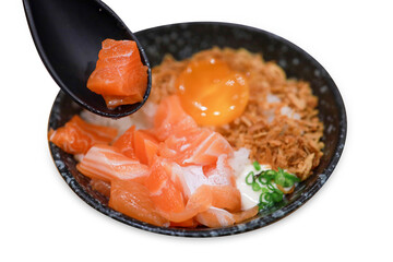 Top view of rice with Pickled Egg Yolk and fresh salmon, focus selective