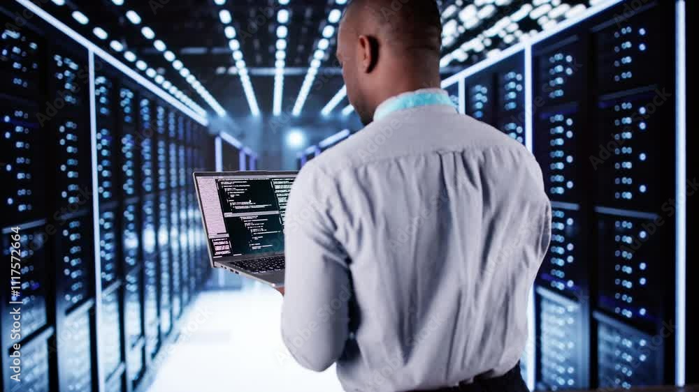 Leinwandbilder happy engineer in data center server room configuring ai