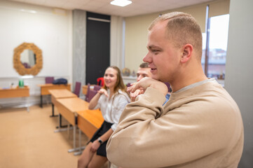 Fototapeta premium Students learn sign language at university. 