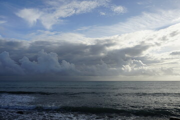 Storm wind at sea. Waves and thunderclouds. Horizon. The elements in all their glory.	