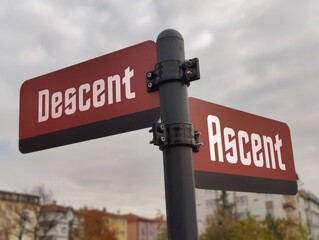 Peaks and Valleys: Ascent, Descent – A Metaphorical Signpost Symbolizing Life’s Highs and Lows,...