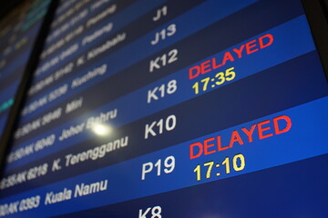 Flight Departure Board Showing Delays at the Airport