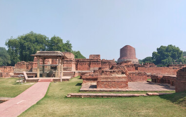 Dhamekh Stupa in Panchaytan temple ruins, Sarnath, Varanasi, India landmarks history is buddhist travel..