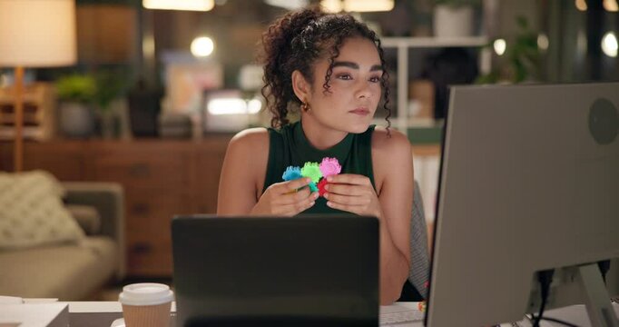 Office, woman and computer at night with fidget toy for stress or ADHD symptoms at work. Internet, reading and research with tech, project and deadline at business with hands busy to relieve tension