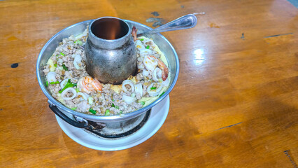 Steamed egg with seafood in hot pot, Thai cuisine