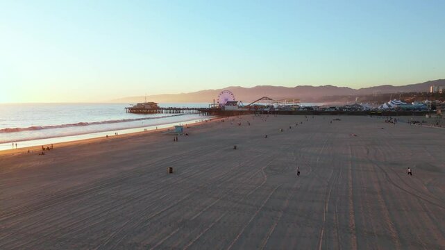 Classic ferris wheel, amusement park on pier in Santa Monica pacific ocean beach