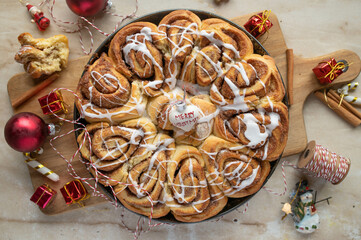 Christmas cinnamon rolls with white sugar icing