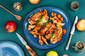 Homemade meat roll with apples and sweet potatoes.