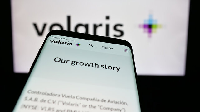 Stuttgart, Germany - 11-11-2024: Smartphone with website of Mexian low-cost airline company Volaris on screen in front of business logo. Focus on top-left of phone display.