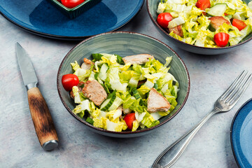 Meat salad with greens and vegetables.