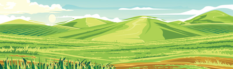 views of a wide green valley surrounded by undulating hills.