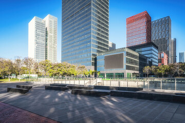 Skyscrapers and Blue Sky Over Urban Park and Walkway
