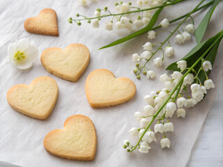 heart shaped gingerbread cookies with lilies of the valley